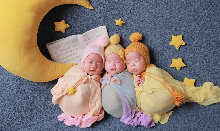 當超音波亮起三顆心跳：「寶寶要成為我們的家人，全部生下來。」